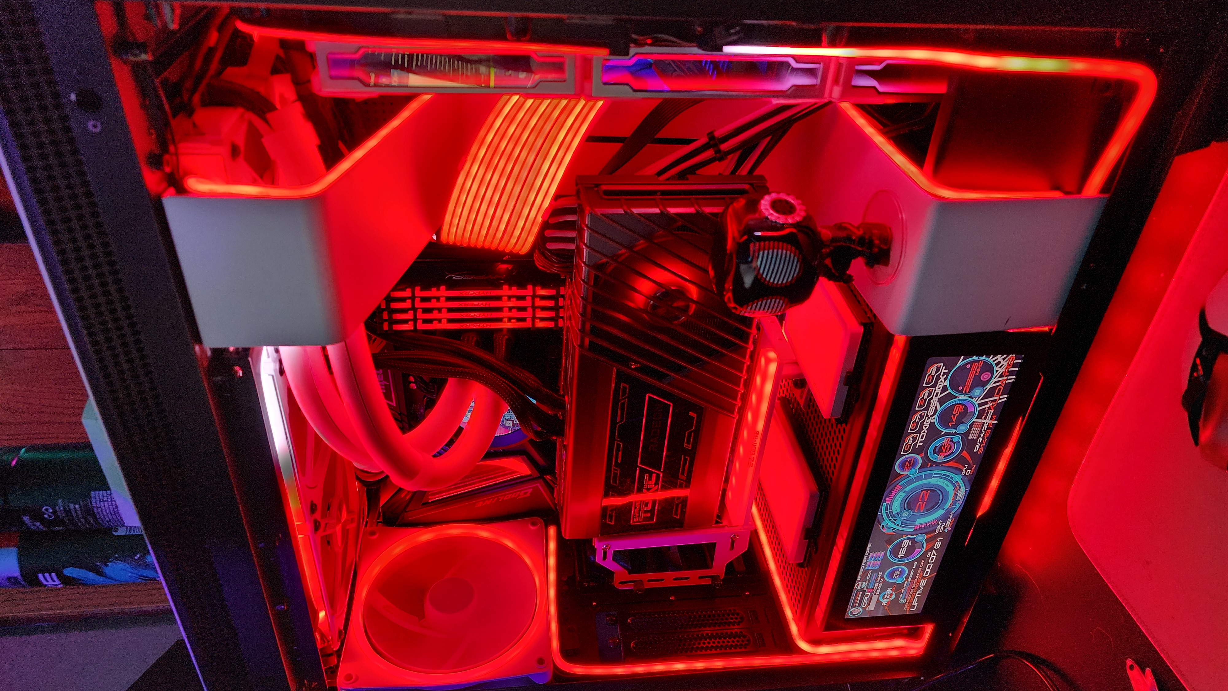 White custom PC build with dual displays
